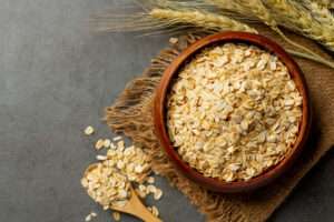 raw barley grain old dark background